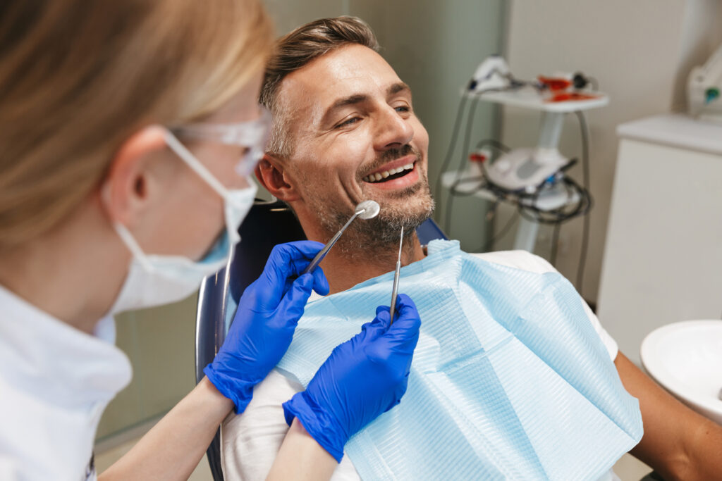 man receiving dental treatment